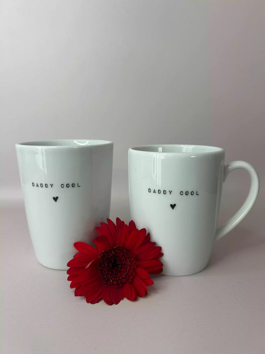 duo composé d'une tasse et d'un gobelet "dandy cool" en porcelaine avec fleur rouge au centre