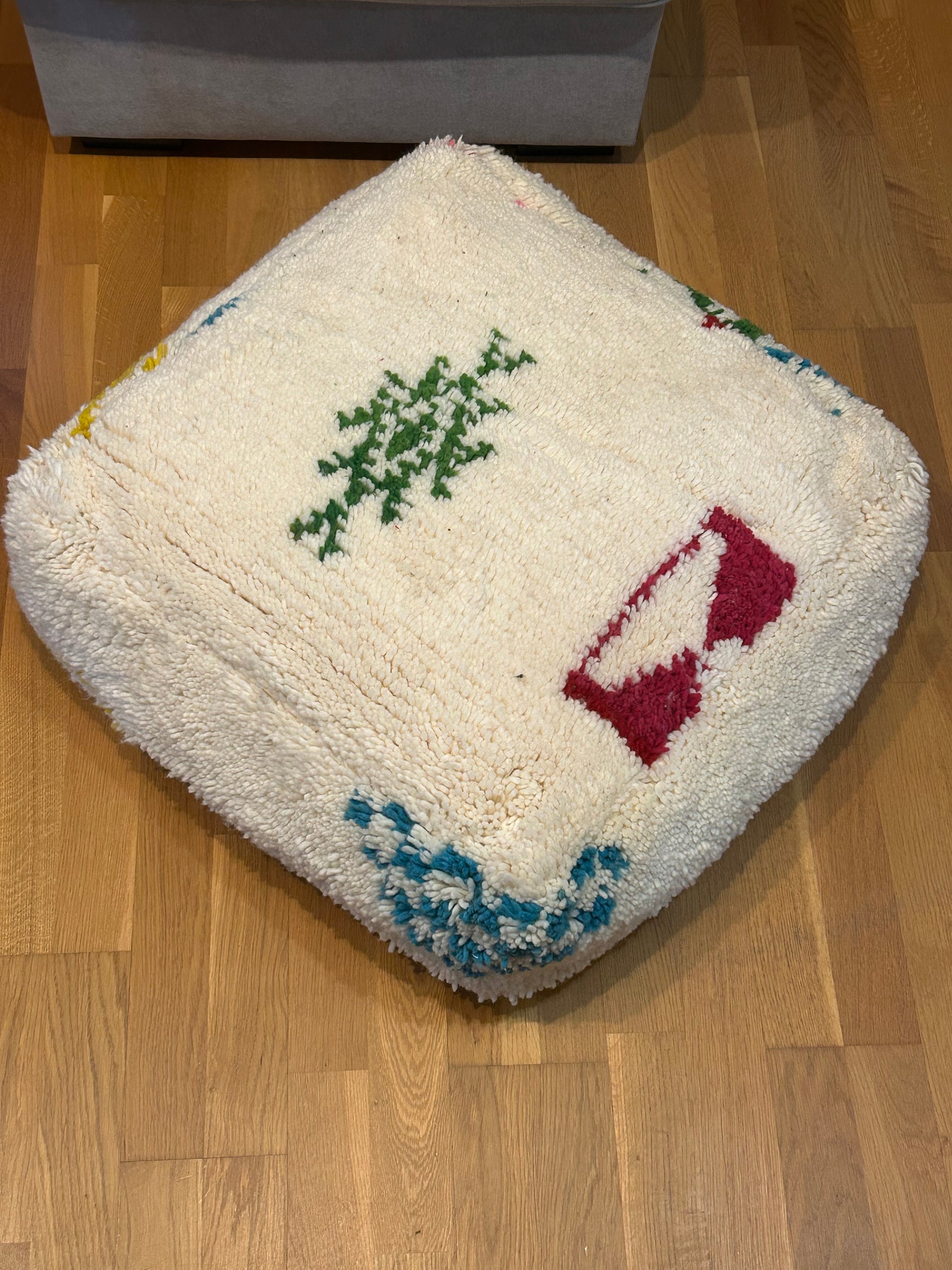 housse de pouf en laine de mouton beni ouarain motif coloré