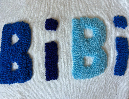 zoom sur le dégradé de bleu et le motif bouclette